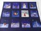 Preview: Patchworkstoff Tomtens Village Panel Adventskalender mit weihnachtlichen Motiven 1